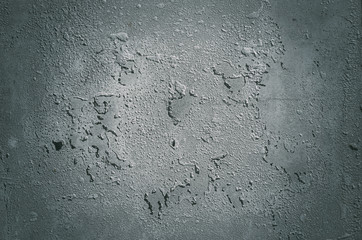Urban concrete wall background with grooves and bubbles. Cement gray wall. Urban and industrialization art concept. Texture like concrete, stone, cement, plaster.. Poster mockup. Сloseup studio shot.