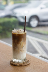 latte coffee with coffee shop background