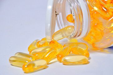 Cod liver oil omega 3 gel capsules isolated on white background