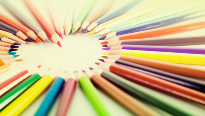 colored pencils lying around the heart