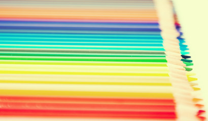 colored pencils lying in row