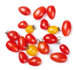 Obraz premium A pile of cherry tomatoes isolated on white background. Top view.
