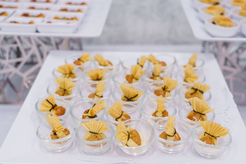 Traditional Thai food many gold bag or money bag fried in mini cup appetizers for visitor party.