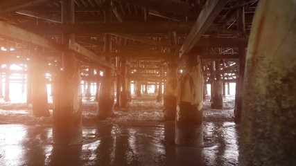 Walking under pier in 4K