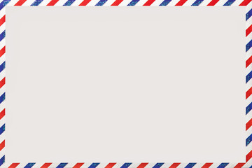 Old post striped envelope, background with copy space. Mail letter with stripped vintage pattern.