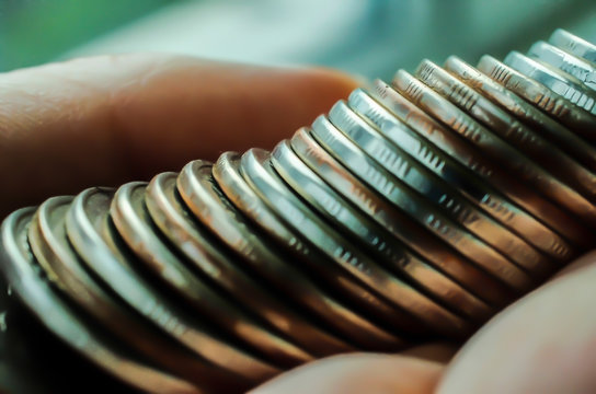 Some metal coins on a habd