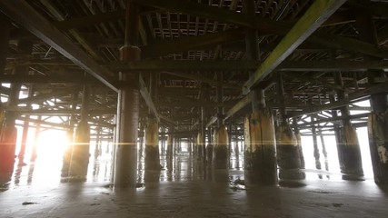 Walking under pier in 4K
