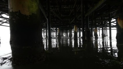 Walking under pier in 4K