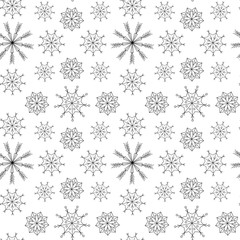 Black and white snowflake seamless pattern. New year and Christmas ornament
