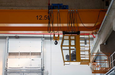 Indoors overhead crane with a cabin