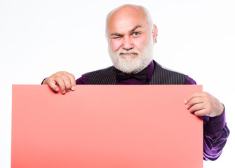 Elderly people. Senior holding blank sign board and looking at camera. Man bold head and gray beard hold poster for advertisement copy space. Senior means experienced. Senior man recommend something