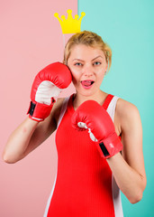 VIP gym. Woman boxing glove and crown symbol of princess. Queen of sport. Become best in boxing sport. Feminine tender blonde with queen crown wear boxing gloves. Fight for success. Fighting queen