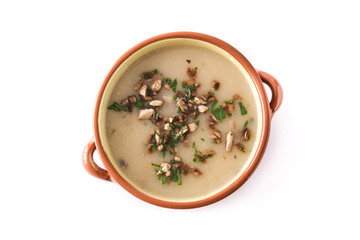 Homemade mushroom soup isolated on white background.Top view
