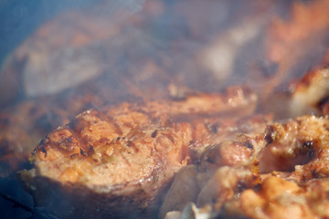 Obraz na płótnie Canvas steaks of red fish grill