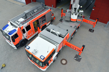 training in altitude rescue at the fire brigade - emergency operation with a crane trolley and...