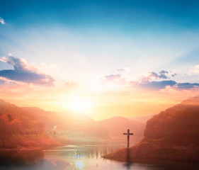 Fototapeta na wymiar Jesus Christ Cross Concept: Crucifixion Of Jesus Christ Cross At Sunset background