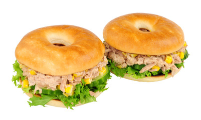 Tuna and sweet corn filled bagels isolated on a white background