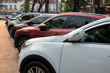 Parallel Cars parked on the urban street side