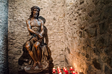 Fototapeta premium BRUGES - BELGIUM / 06.05.2015: A statue of Jesus in the Basilica of the Holy Blood in Bruges Belgium