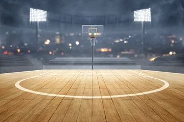 Fotobehang Basketball court with wooden floor, lights reflectors, and tribune © Leo Lintang