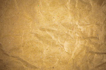 Vignette brown crumpled paper.