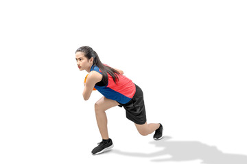 Asian woman basketball player in action with the ball