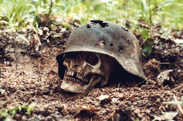 German military helmet. Third Reich.human skull.The Second World War. leaky and rusty military...