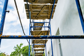 Scaffolding stand near the house under repair