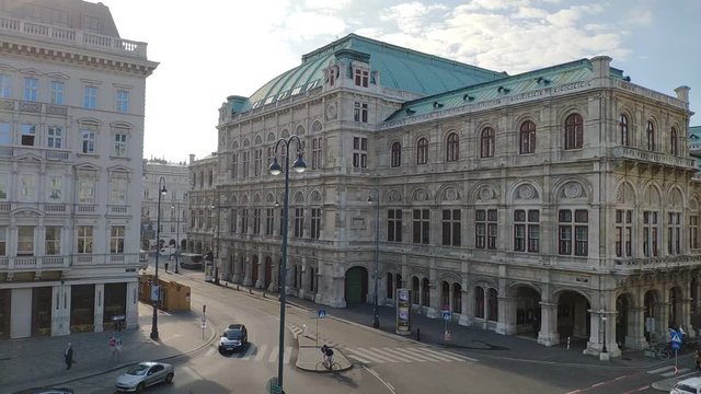 Vienna/Austria - 09 15 2018: Timelapse on Operngasse street with view on Vienna State Opera from Albertina museum platz by sun day