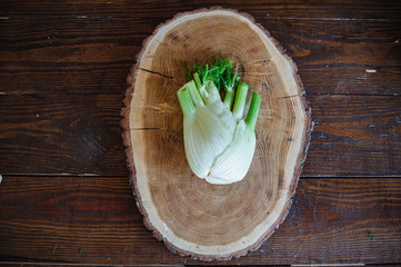 Fresh fennel bulbs or Fennel bulb on wooden background. Healthy fennel bulbs.