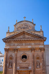 Obraz premium Confraternity of Carmine church in the white city Ostuni, famous tourist destination in Brindisi province, Region Apulia(Puglia), southern Italy. Clear blue sky