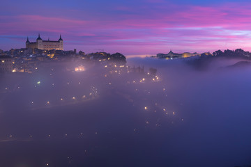 Views of the beautiful city of Toledo (Spain) bathed in fog