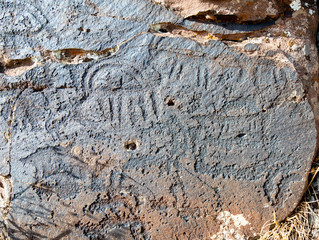 ancient cave paintings. petroglyphs in the wild.