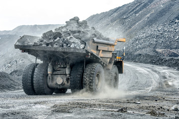 Large quarry dump truck. Transport industry. - obrazy, fototapety, plakaty