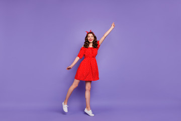 Full length photo of pretty lady going to fly air wear off-shoulders dress isolated purple background