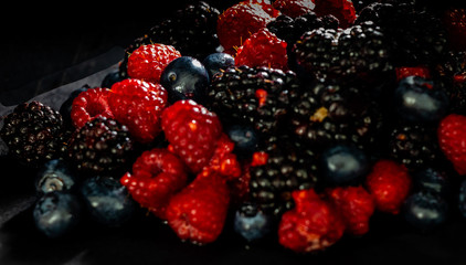 Mixed berries in the black. Calgary, Alberta, Canada