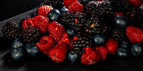 Mixed berries in the black. Calgary, Alberta, Canada