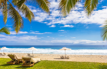 Obraz na płótnie Canvas beach with chairs and umbrellas, Boucan, Réunion Island 