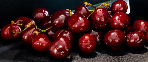 BC cherries in the black. Calgary, Alberta, Canada