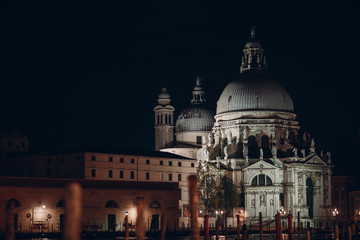 Fototapeta na wymiar Old cathedral of Santa Maria della Salute at night Venice, Italy