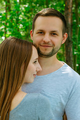Fototapeta premium Loving couple holding tight and embracing close