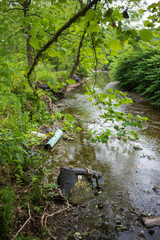 Trash left behind in a creek in South Park, Pennsylvania.