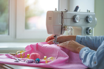 Sewing process. Sewing clothes using a sewing machine and accessories