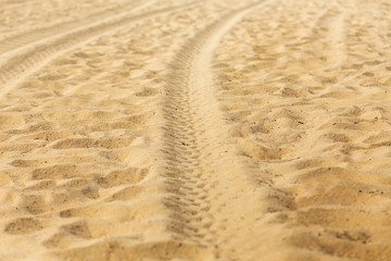 Wheel car mark on sand