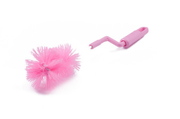 Pink brush for cleaning bottle isolated on white background.Copy space