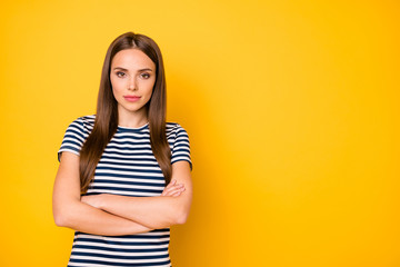 Close up photo of cool lady with crossed arms company representative wear striped t-shirt isolated yellow background