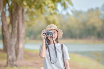 Asian Women camera Travel and Take photo Nature