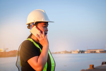 Female engineer talking on the phone