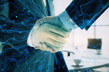 Double exposure of brain drawing on office background with two men handshake. Concept of innovation