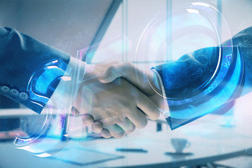 Multi exposure of seo icon hologram on office background with two men handshake. Concept of data search